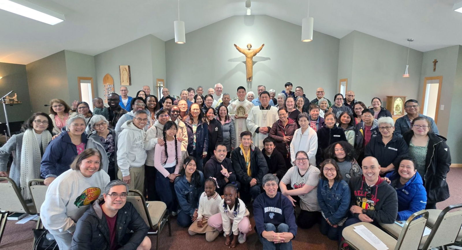Parishioners of St Gerard's, Winnipeg, gathered inside St Francis of Assisi Parish during their pilgrimage to Pinawa